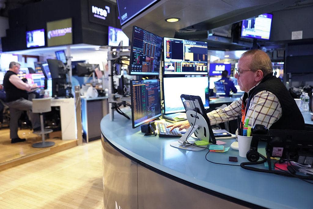 Wall Street traders reacting to US economic outlook data