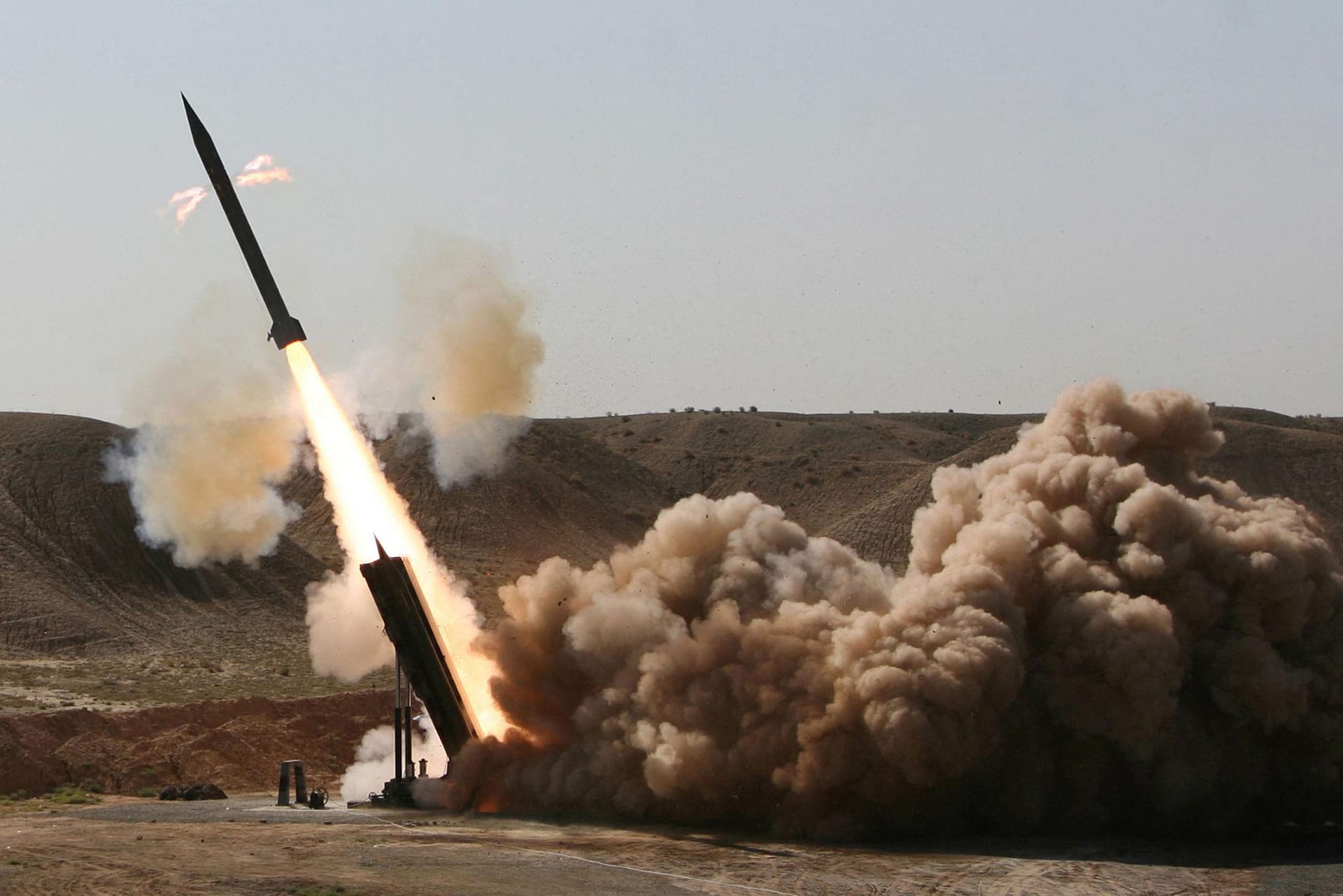 Iran Missile Launch Sends Shockwaves Through Middle East – Tehran 2026 2 Iran missile launch plume visible above testing range during military exercise